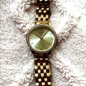 Gold tone watch